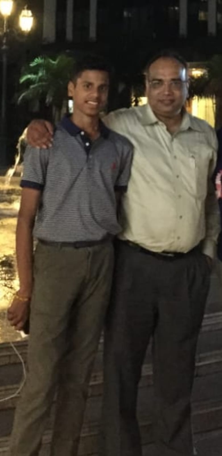 Ribhav at his leanest, standing with his father